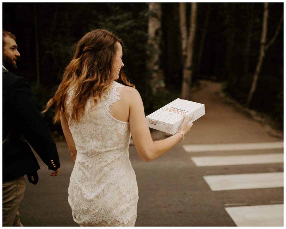 How could you not smile after you just got married and you have a box of donuts in your hand?