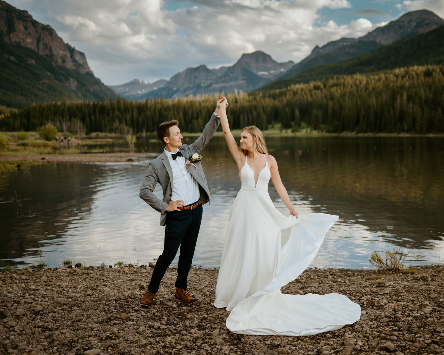 Lucas spinning Bailey on their Bozeman elopement day at the Hyalite Reservoir.