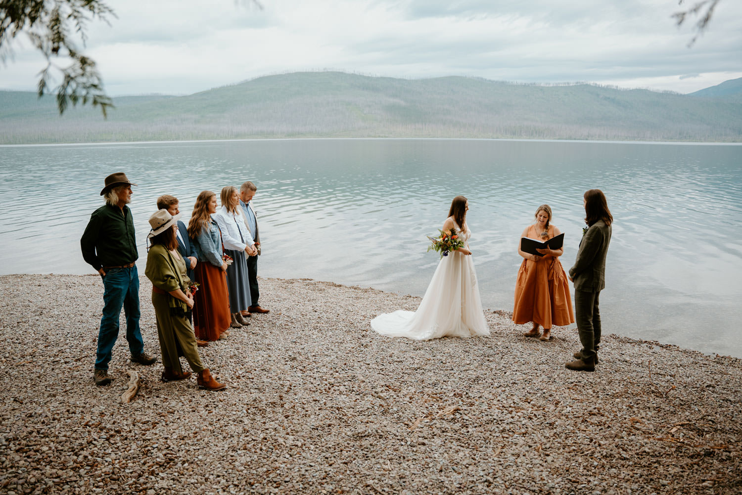 Wedding ceremony on the shore of Lake McDonald in Glacier National Park.