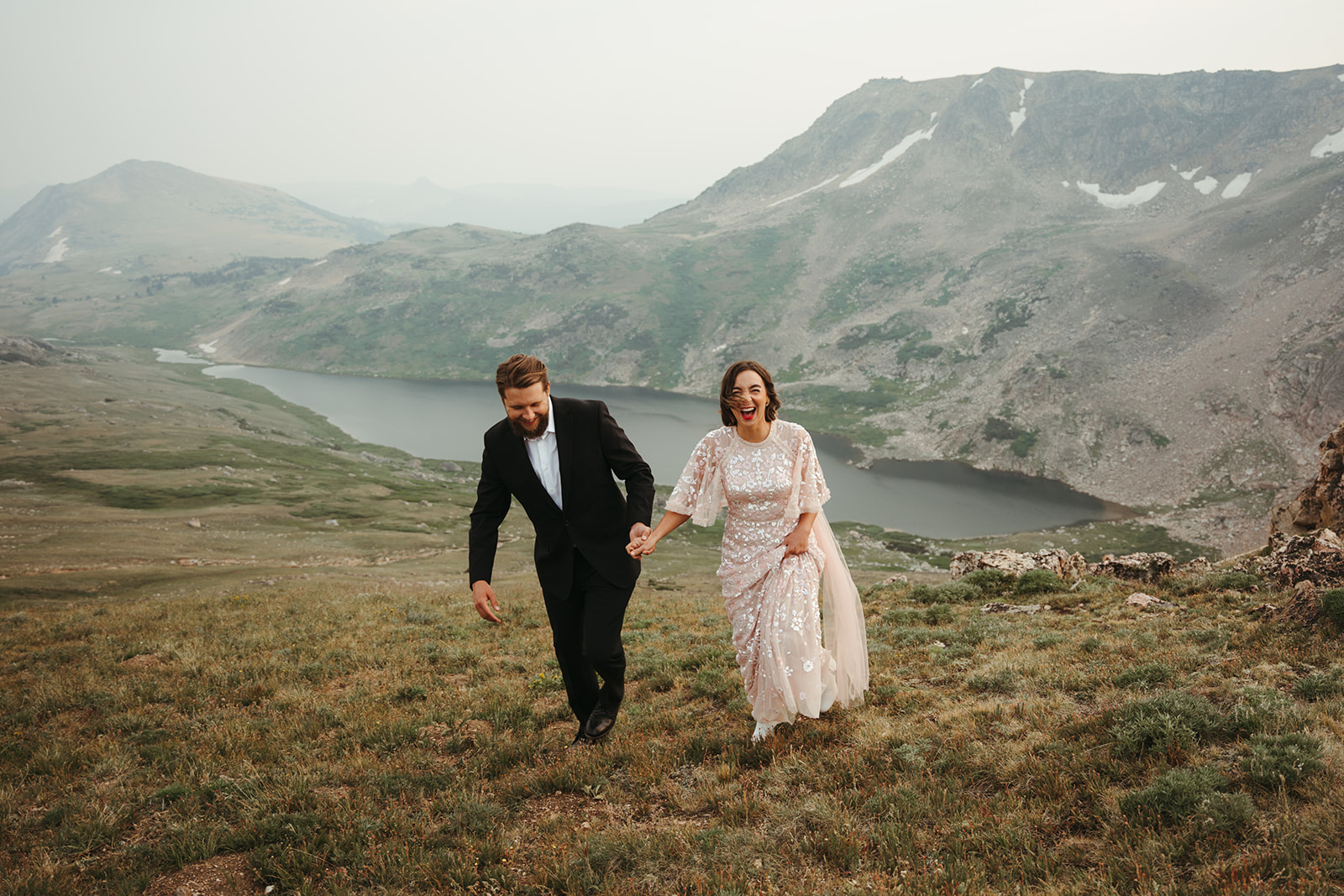Niky and Vlad holding hands during their Montana elopement in the Beartooth Mountains.